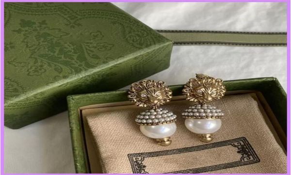 

2022 street fashion women earrings luxury designer jewelry pearl lion earring ladies ear studs retro designers d211102717939, Golden