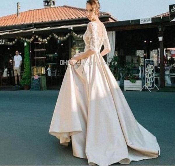 

gorgeous french lace half sleeve wedding dresses 2018 illusion bodice overskirts long steven khalil real pictures bridal gowns fre5925670, White