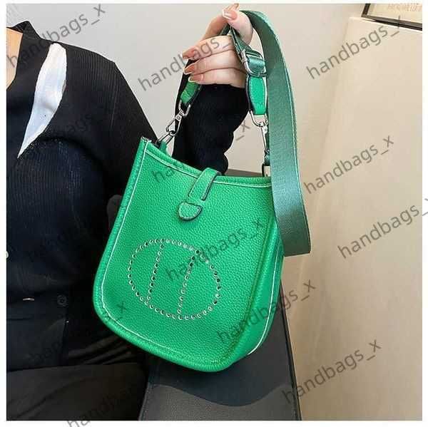 

factory handbags are exported online 2023 spring fashion women's solid color simple small square bag texture single shoulder msenger pu