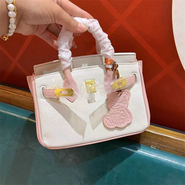 

h ermes fashion brikis's handbags for sale 2023 new lychee pattern bag women's crossbody colored little bear commuter small handba