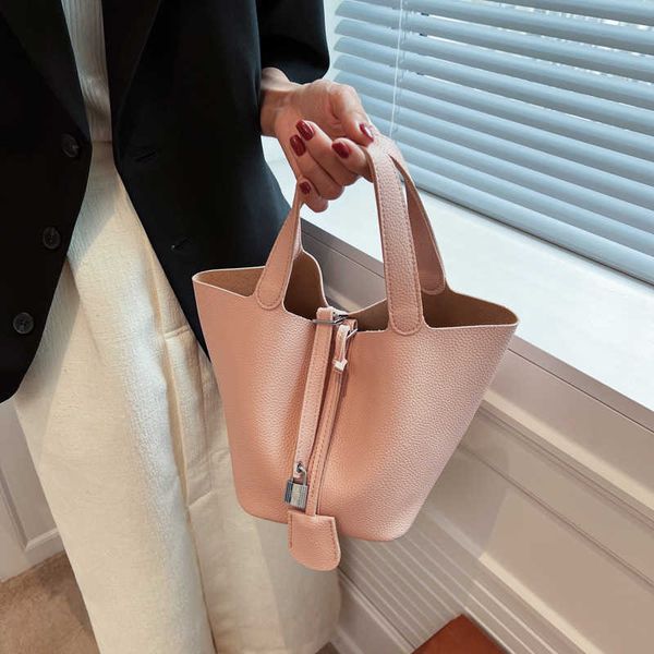 

a designer tote bag her mas handbag h picotn designer bags baroness bag female summer versatile minority handheld bucket texture one shoulde