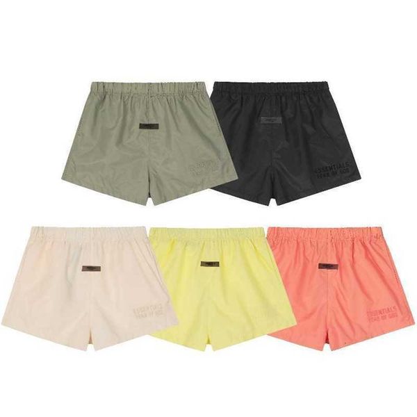 

23ss flocked esential season 8 solid elastic woven nylon shorts, White;black