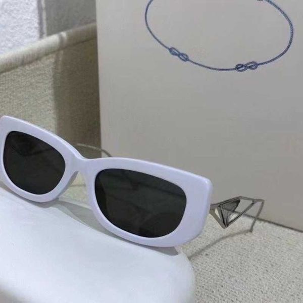 

designer sunglasses in family's new pra square hollow out mirror legs with triangular sunglasses have high appearance value are popular, White;black