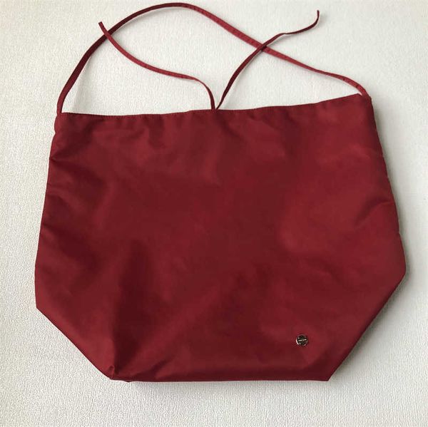 

the row is simple and low-key high-density waterproof nylon large capacity bucket bag lightweight sports fitness shopping bag