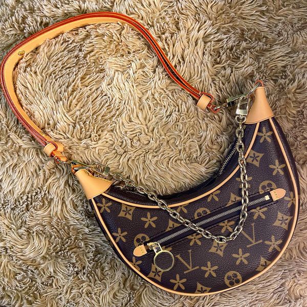 

luxury genuine leather fashion shoulder travel half moon bag women designer loop m81098 handbag clutch bags men latest chain chain vacation