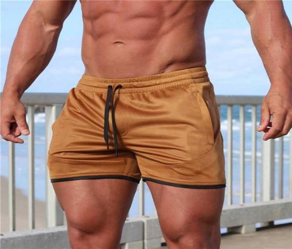

men039s shorts 2021 men fitness bodybuilding man summer gyms workout male breathable mesh quick dry sportswear jogger beach sho2349398, White;black