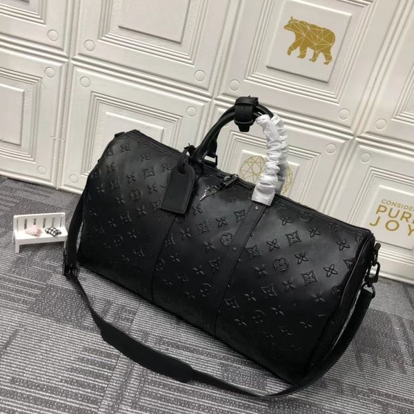 

designers duffel bags 50cm luxury large capacity travel sale women men genuine leather shoulder fashion bag carry rivets with lock black emb