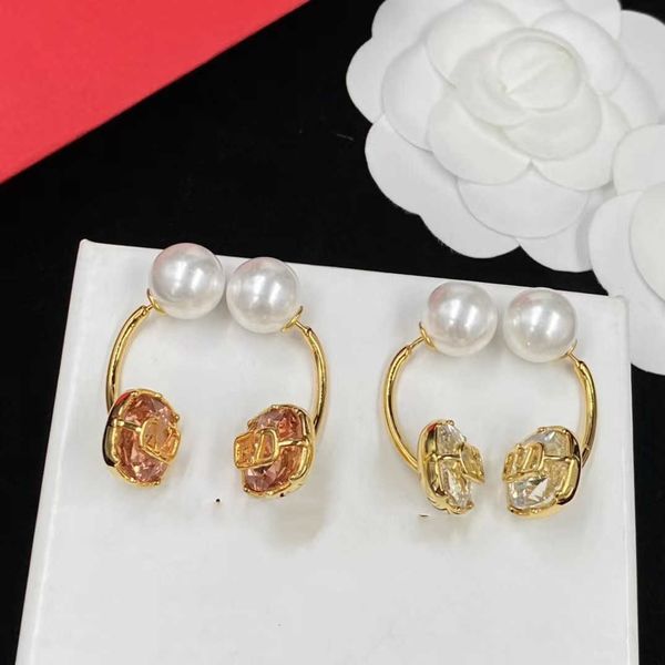 

fashion designer valentino warren pink diamond pearl earrings female brass material french light luxury versatile and, Golden