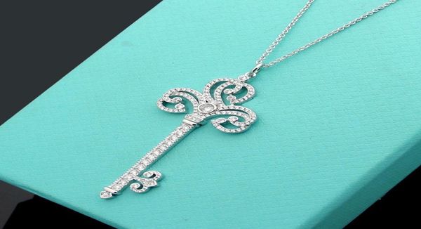

new arrive fashion lady brass 18k plated gold long necklace with full diamond key pendant sweater chain8361450, Silver