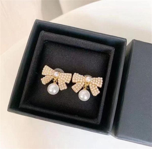 

pearls earrings back designer luxury ladies gilded diamonds 925 silver needle bowknot earring with gift box x0907c291w8873527, White