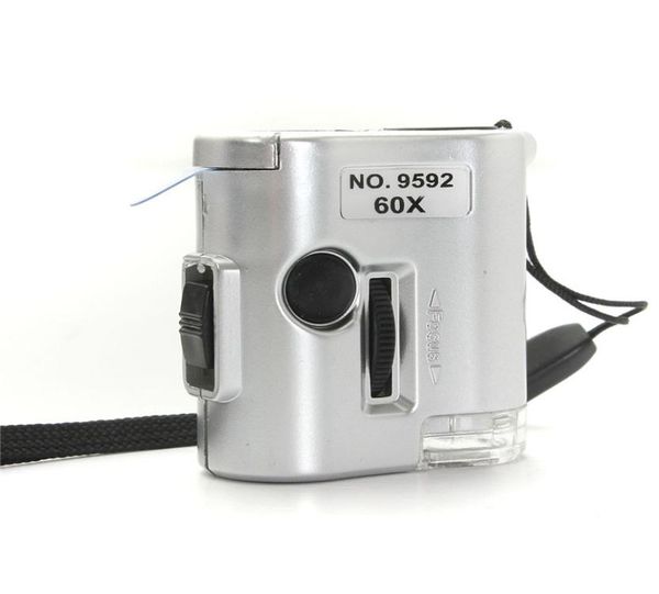 

mini 60x microscope illuminated magnifier glass jeweler loupe lens with led uv light watch repair tool2244188