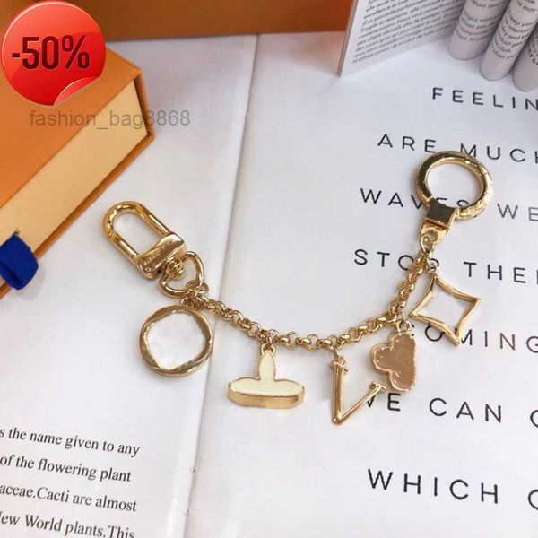 

lanyards luxury designer keychain classic brand key buckle flower letter chain handmade gold mens womens bag pendant 441ess, Silver
