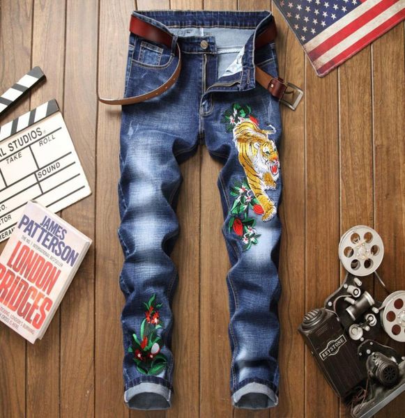 

new style men039s jeans pants tiger head embroidered slim straight male tight trousers trend blue motorcycle jeans streetwear c8066399
