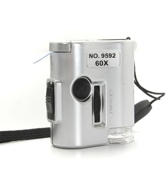 

mini 60x microscope illuminated magnifier glass jeweler loupe lens with led uv light watch repair tool1002811
