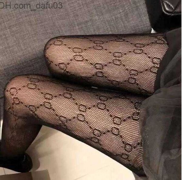 

socks hosiery autumn and winter tight one-piece silk stockings pattern elastic black fishnet tight silk stockings with hollow 72f1'&#03, Black;white