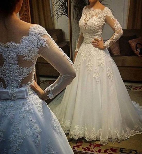 

long sleeve ball gown wedding dress luxury pearl beaded bateau neck bridal dresses with lace appliques sheer vestido 3262914, White