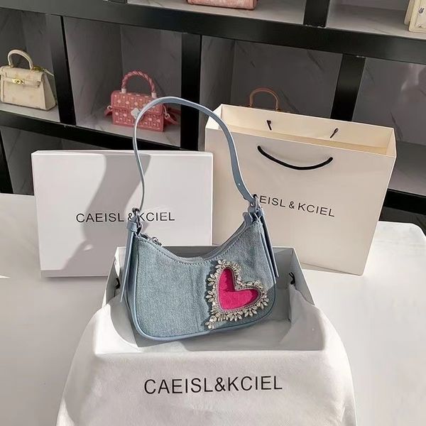 

denim tassel love underarm bag for women in 2023, new french niche design, high-end feel rhinestone shoulder bag trend