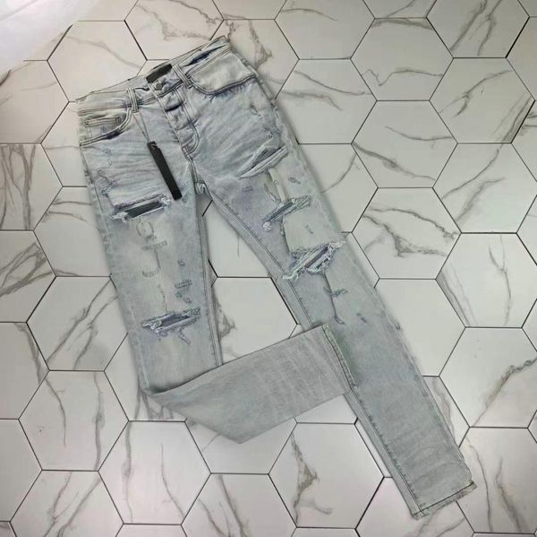 

522021 fashion wash light blue big hole jeans micro elastic slim high street man2955697