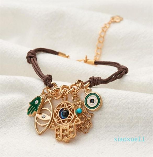 

blue eye leather bracelet hamsa hand of fatima wax rope bracelets for girls women whole jewely 78 k22539266, Golden;silver