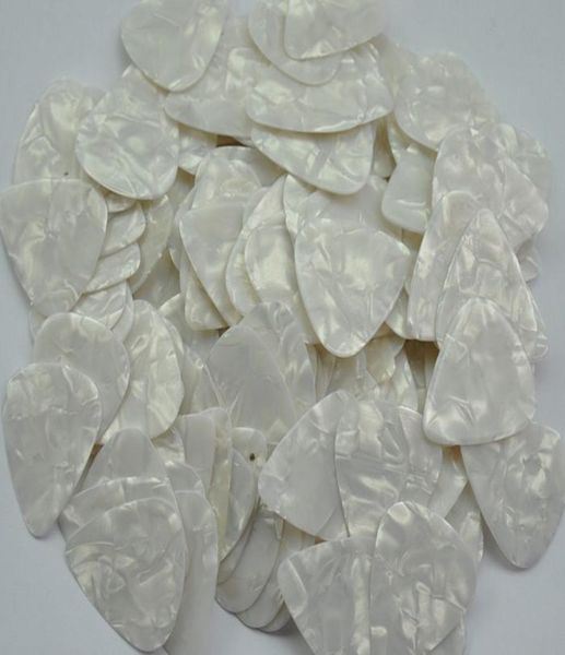 

lots of 100 pcs medium 071mm guitar picks plectrums celluloid pearl white7273231