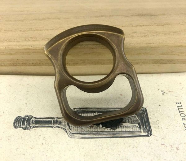 

solid brass retro finger ring edc outdoor selfdefense survival tactics knuckles bottle opener key chain broken window tool7778498