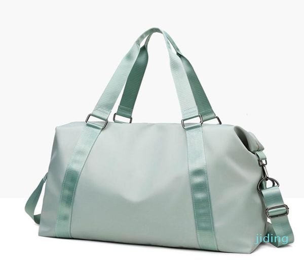 

hand yoga bag female wet waterproof large luggage bag short travel bag 502822 with brand logo9809159