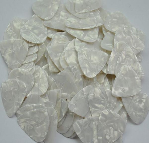 

lots of 100 pcs medium 071mm guitar picks plectrums celluloid pearl white4907633