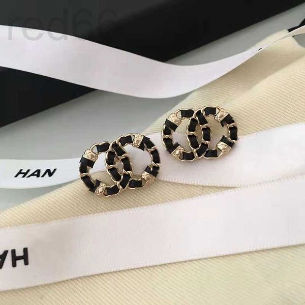 

charm designer new style small fragrant line knitted earrings with black peel through personalized design, high grade light luxury silver ne, Golden