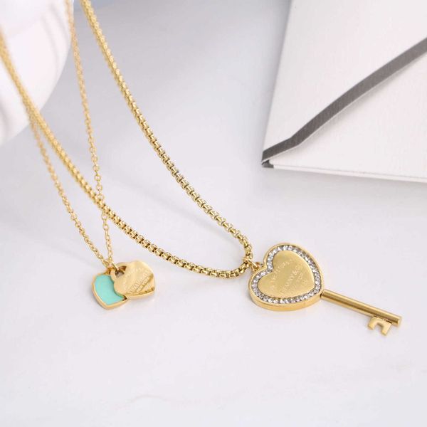 

Luxury Tiff fashion brand jewelry French Elegant Blue Oil Dropping Heart Sticky Diamond Key Double Layer Titanium Steel Necklace Women's Clavicle Chain