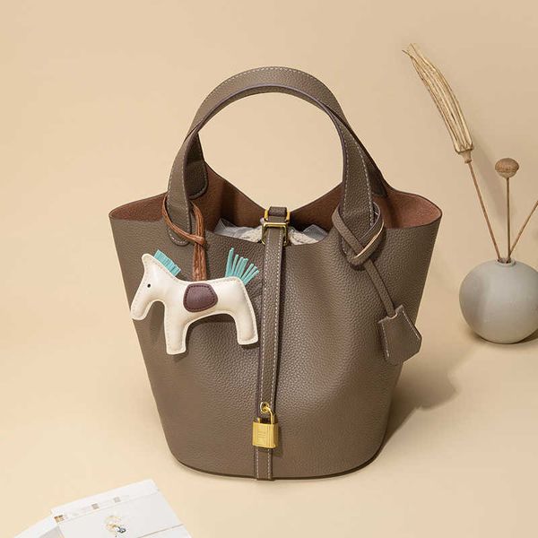 

factory designer h ermes bucket bags for women online shop womens 2023 vegetable basket style wedding bag litchi pattern with real logo
