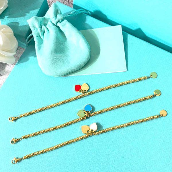 

Luxury Tiff fashion brand jewelry Enamel Love Bracelet Titanium Steel Colorless Peach Heart Round Beads ins Simple and Cold Style Handicraft Valentine's Day Gift