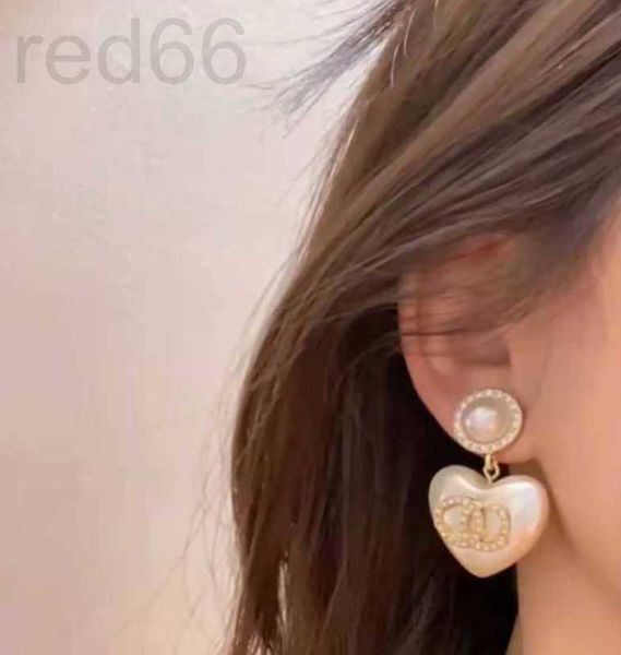 

charm designer small fragrant wind earrings pearl peach heart c family zircon 925 silver needle classic love white mesh red temperament tdc6, Golden