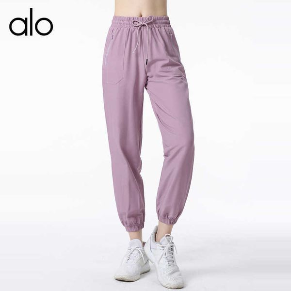 

alo yoga's new fast drying loose fitting sports pants for women with high waistband yoga pockets casual pants drawstring and buckle, White;red