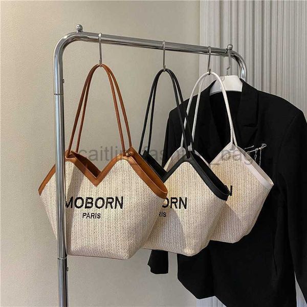 

beach straw large capacity handbag 2023 this year's trend weaving autumn and winter new single shoulder underarm tote bag is fashionabl