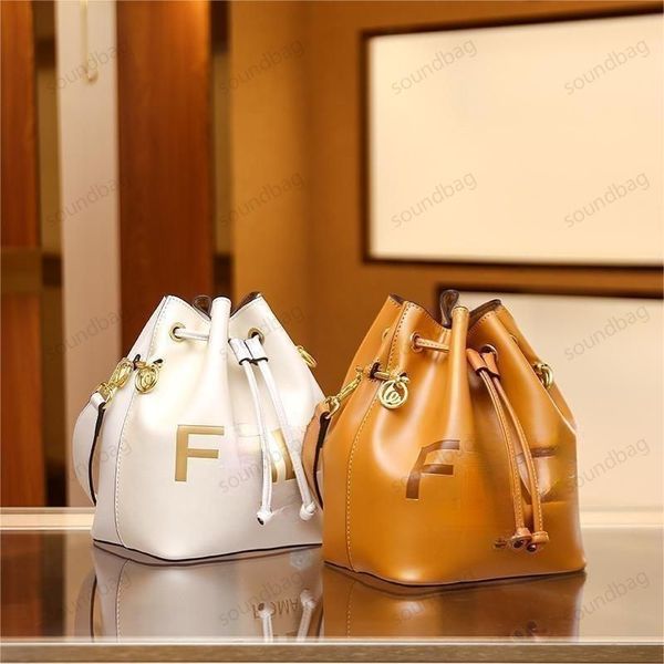 

2023 autumn-winter luxurious genuine leather bucket bag: classic design with modern letter drawstring mini mobile pouch in bronzed platinum