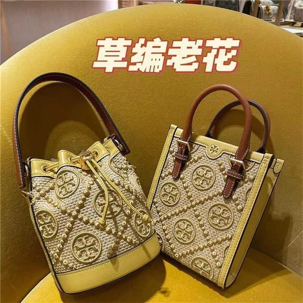 

56% off designer bag 2024 early launch tb new 1621 piano score canvas women's lucky rabbit cartoon shoulder vertical version wind cross