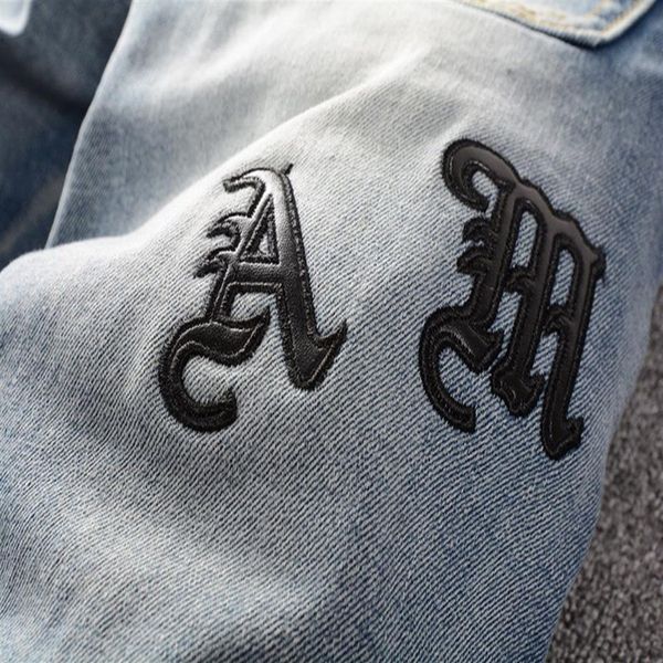 

designer fashion blue mens slim jeans skinny casual fluff folds holes motorcycle pants ripped denim roman script letter318y