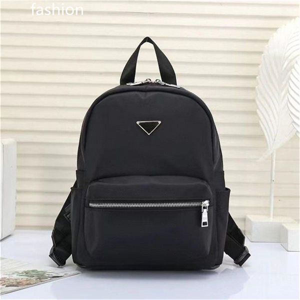 

new small boys and girls school bags fashion cute waterproof load protection ridge ultra-lightweight children's backpack d7