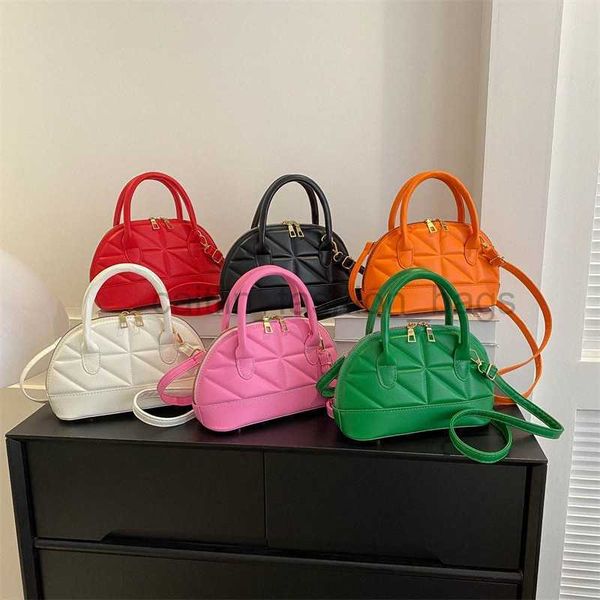 

2023 fashion pressed shell small for women's korean edition ins foreign texture handheld simple crossbody caitlin_fashion_bags