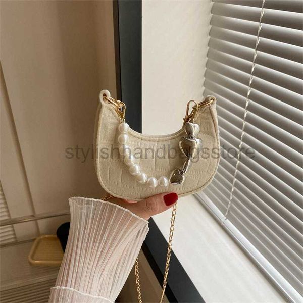 

cross body trendy solid color women's bags niche and high-end 2023 new pearl temperament trendy mobile phone bags fashionable girls&#03