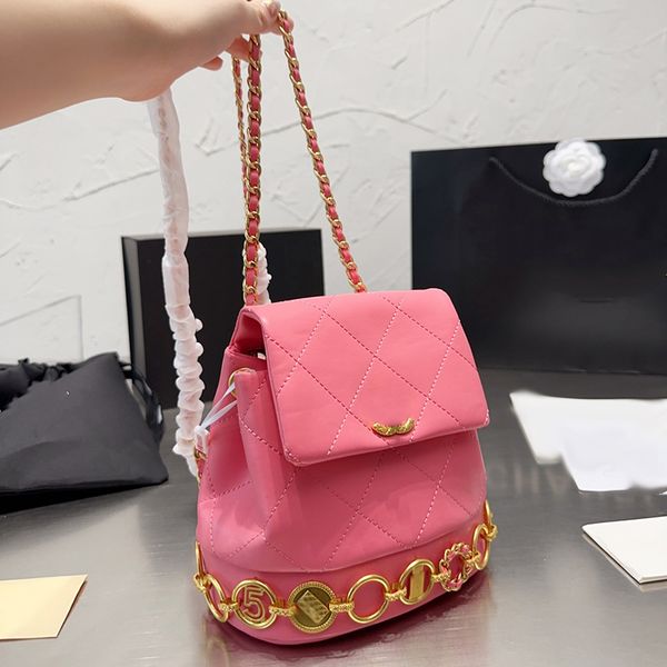 

designer womens backpack clamshell gold hardware metallic clasp luxury handbag matelasse chain shoulder bag enamel badge sweet princess bags