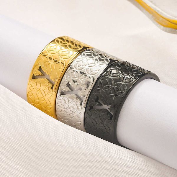 

fashion l designer stainless steel four leaf grass pattern letter ring titanium seal cold wind mesh red, Silver