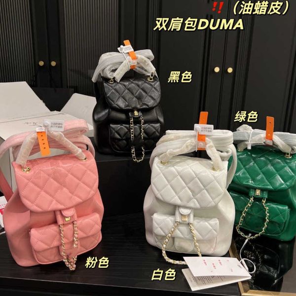 

2023 new leisure oil wax cowhide fashion backpack small fragrant duma sheepskin backpack lingge chain women's bag