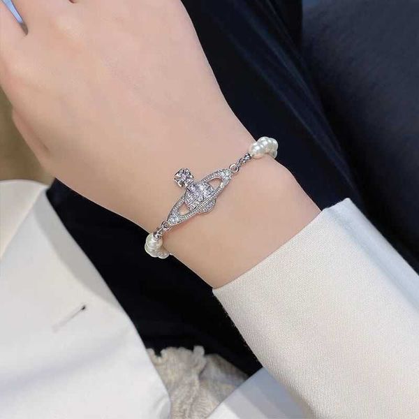 

vivian bracelet net red slightly western empress dowager saturn bracelet women's style pure handmade milk pearl knot handicraft, Black
