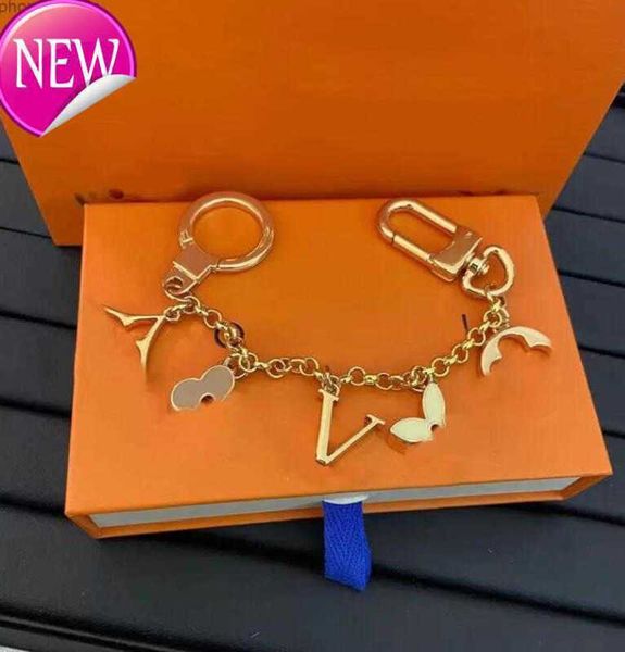 

keychains lanyards fashion brand keychain letter designer metal womens bag charm pendant auto parts 606ess, Silver