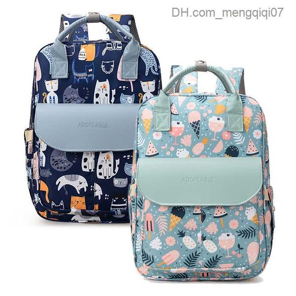 

diaper bags 2023 mommy bag multifunctional printing dial bag backpack fashion large capacity baby travel bag cart travel bag z230816