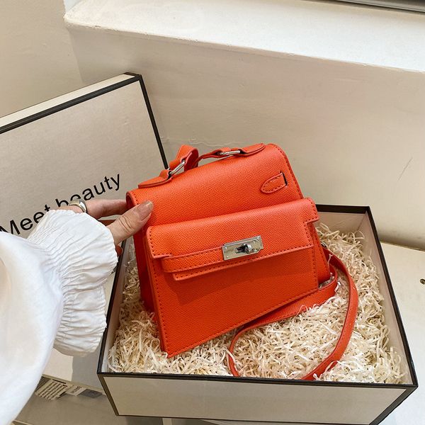 

Factory wholesale ladies shoulder bag 6 colors niche design solid color leather handbag street asymmetric buckle backpack Joker lychee pattern handbags 6612#, Orange