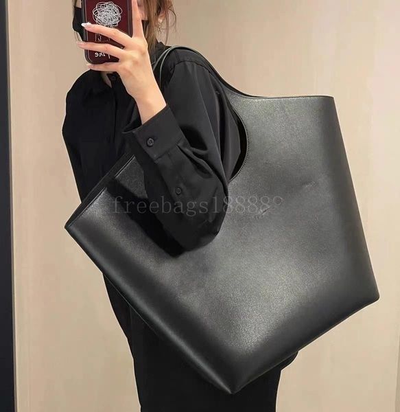 

designer bag large capacity tote bag single shoulder pure black large bag small bag irregular design hand bill shoulder women's bag