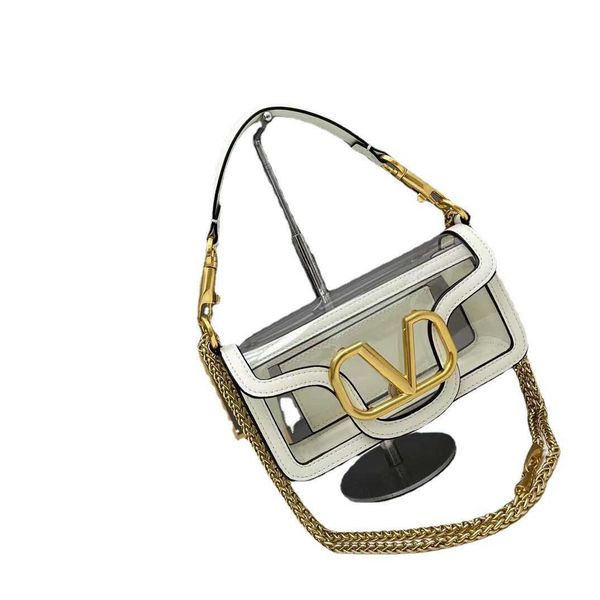 

2023 v v new designer 2023 bags for ladies summer street fashion spliced transparent handbag made of cowhide material handheld magnetic buck