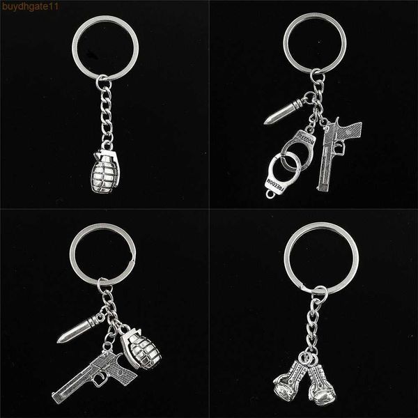 

0y00 key rings xiangmou's selling creative bullet head handgun thunder handcuffs keychain metal keychain, Slivery;golden